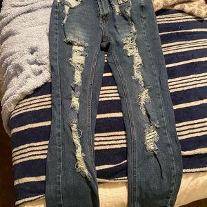 Ripped skinny jeans. Almost famous